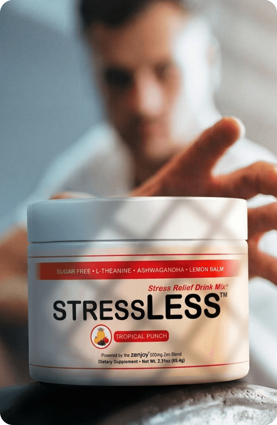 A man holding out a tub of StressLESS