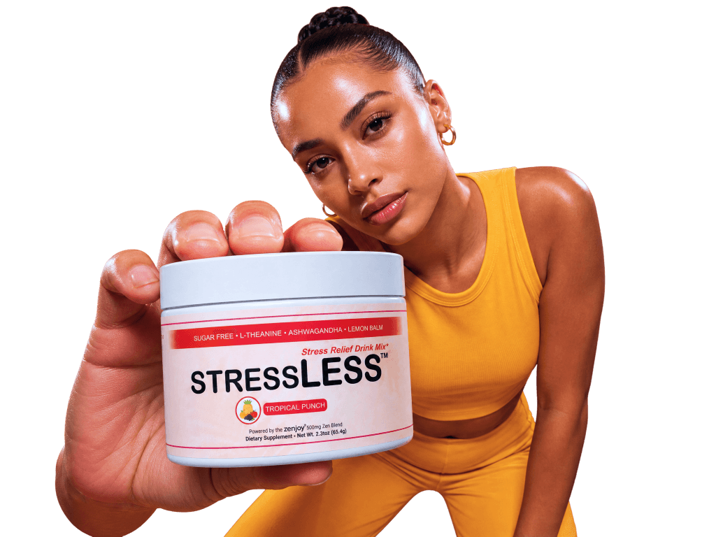 Woman holding a StressLESS tropical punch drink mix tub